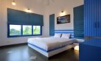Bedroom 1 in 3BHK villa: Spacious and inviting.