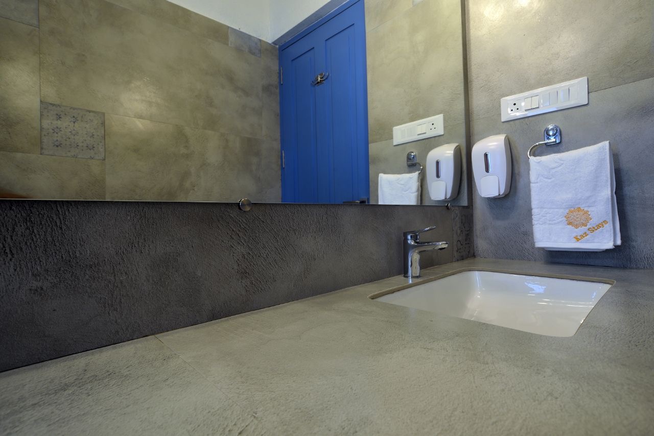 Bathroom sink in 3BHK villa: Clean and functional.